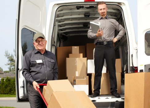 Boxes labelled for rooms during a local home move service