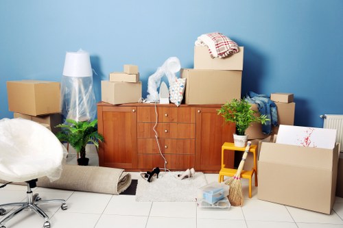 Removal team loading household items for a move