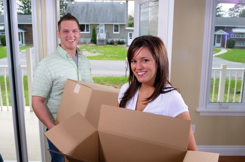 Packed boxes and furniture ready for local removals in Edgware