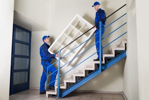 Trained movers handling household items with care