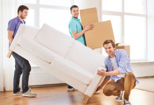 Removal team sorting recyclable items during an Edgware move