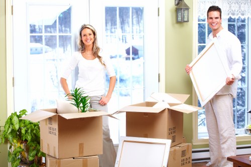 Removals van loading student items from an Edgware property