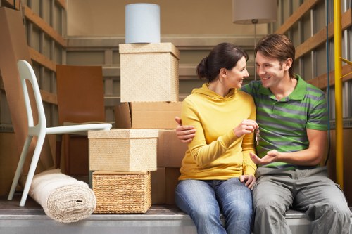 Unpacking household items in a new Edgware property